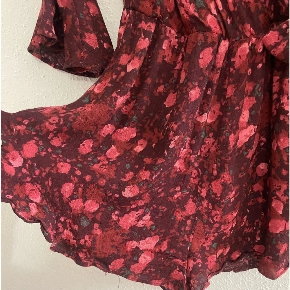 Free People All The Right Ruffles in Wild Moon Floral Romper Size XS OB397455.